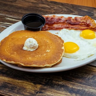 TWO EGGS AND PANCAKES